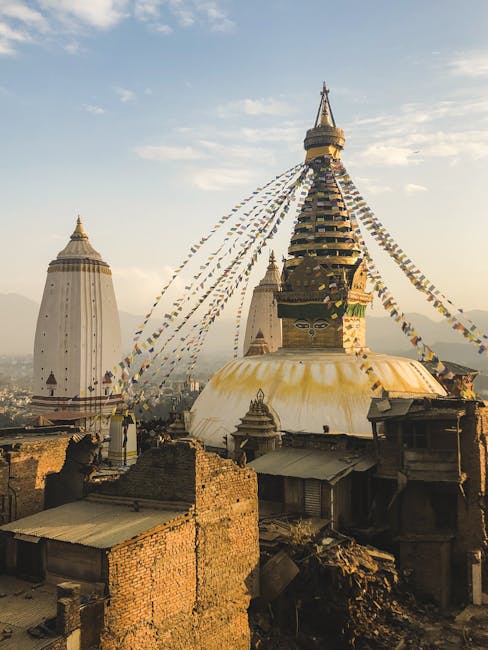 A view of the iconic Boudhanath Stupa with prayer flags in Kathmandu, Nepal.
