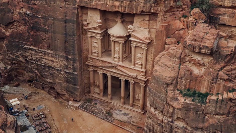 Stunning aerial view of Al-Khazneh, Petra in Jordan, showcasing ancient architecture.
