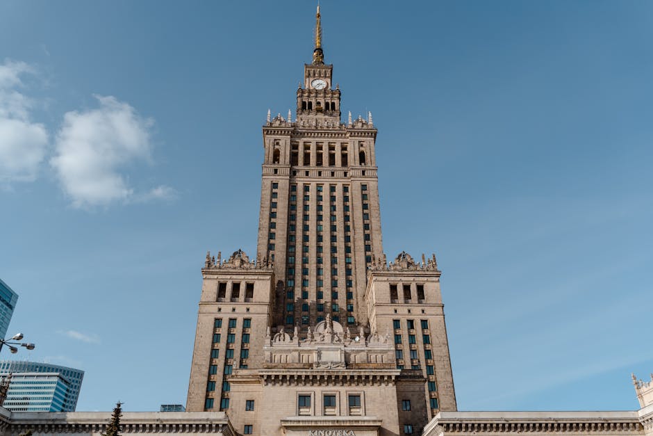 A low-angle shot of the historical Palace of Culture and Science in Warsaw, Poland.