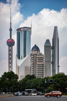 Stunning view of Shanghai skyline with iconic Oriental Pearl Tower and modern skyscrapers.