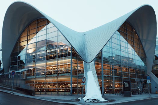 Contemporary design of Tromsø library with unique roof structure in Norway.