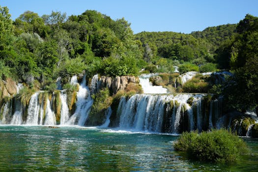 Beautiful cascading waterfalls in lush Krka National Park, Croatia, during summer.