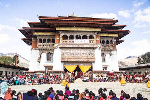 Vibrant celebration at Punakha Dzong, showcasing Bhutanese culture and architecture.
